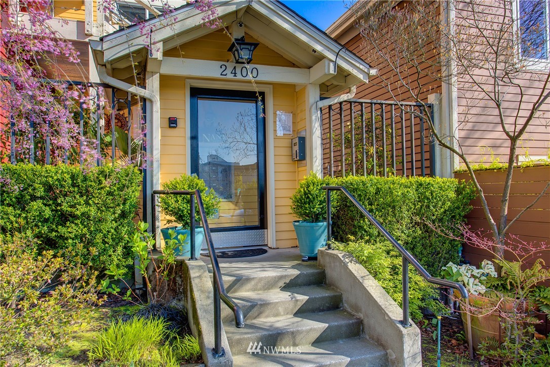 2400 East Howell Street, Unit E Seattle, WA 98122 - Photo 37 of 39 a front view of a house with plants