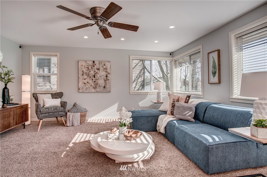 2400 East Howell Street, Unit E Seattle, WA 98122 - Photo 6 of 39 a living room with furniture and a large window