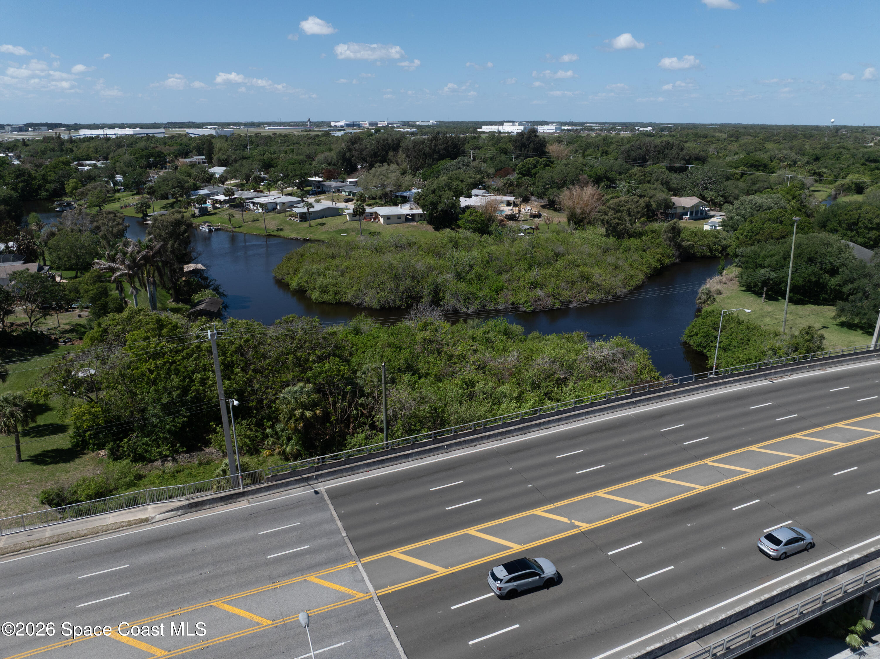 684 Rear N Harbor Drive Melbourne, FL 32935 - Photo 3 of 11 an aerial view of residential houses with outdoor space and street view