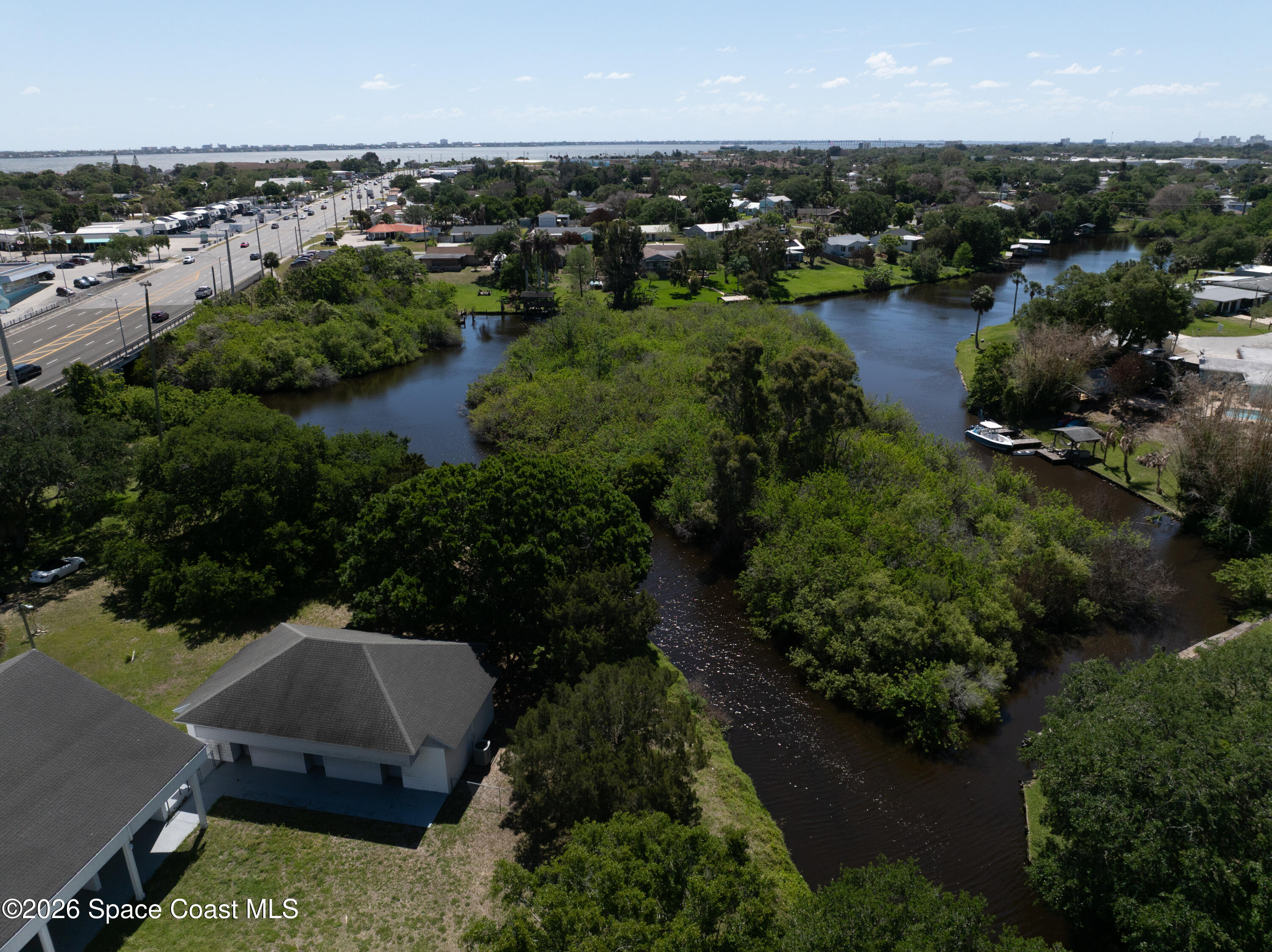 684 Rear N Harbor Drive Melbourne, FL 32935 - Photo 6 of 11 an aerial view of city lake and trees