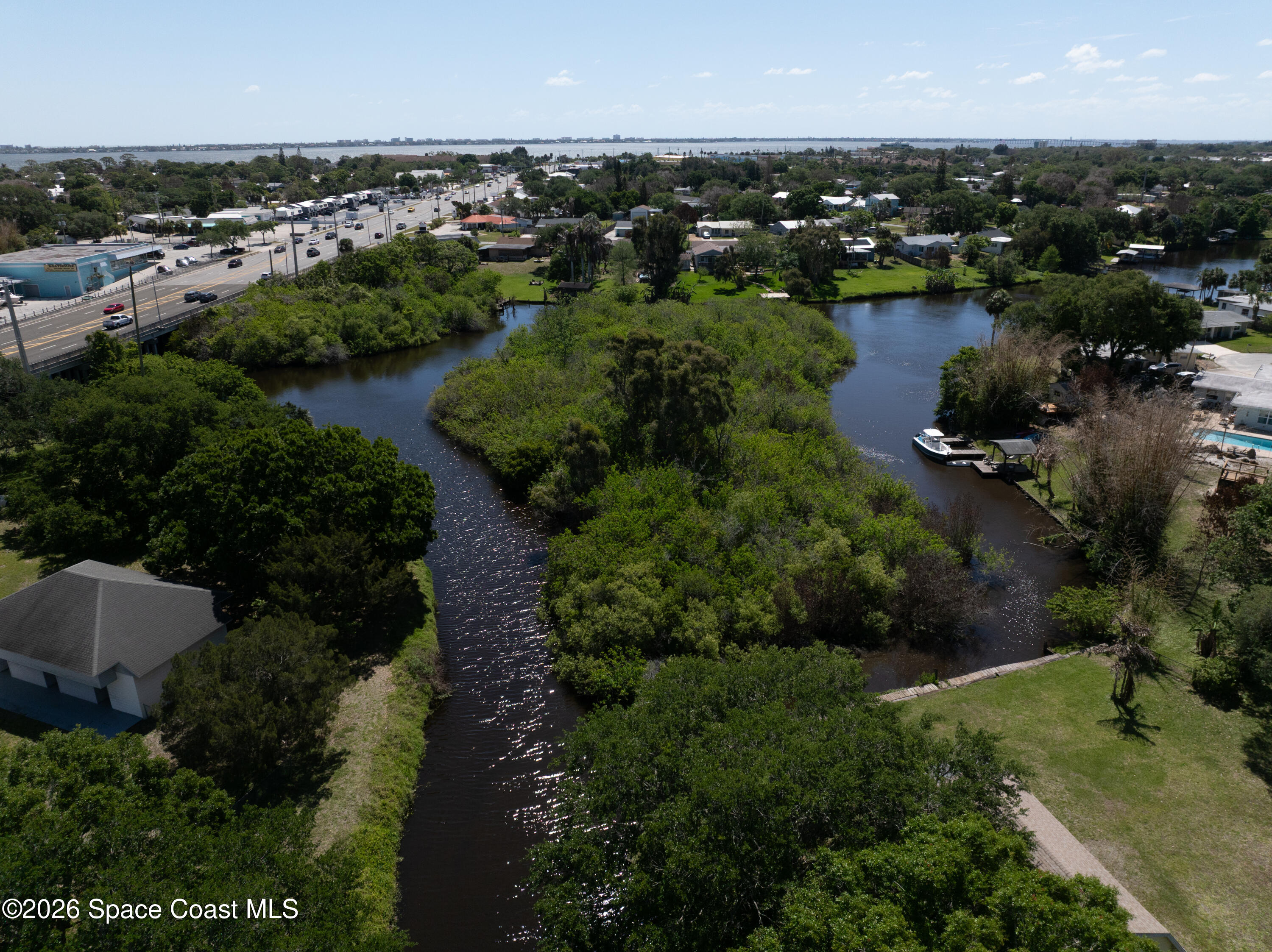 684 Rear N Harbor Drive Melbourne, FL 32935 - Photo 7 of 11 an aerial view of city and lake with boats