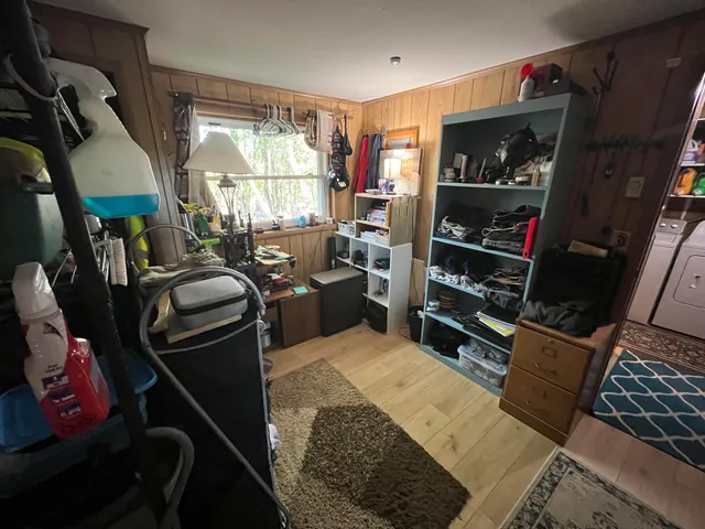 a bed room with a bed and a window