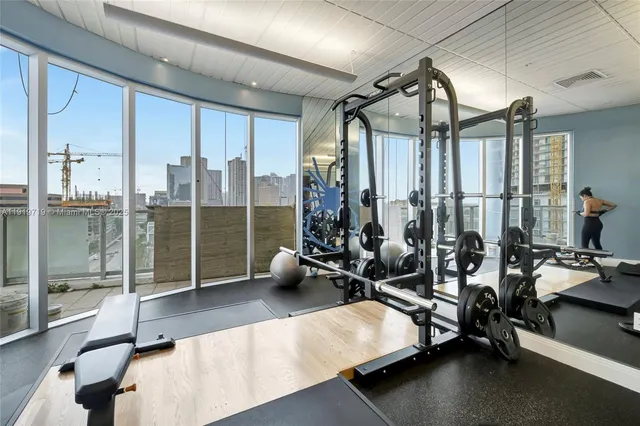 a view of a room with gym equipment