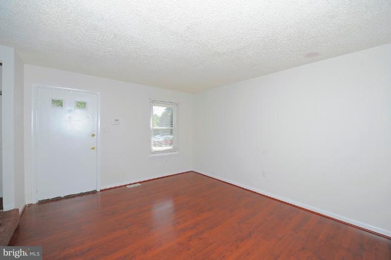 8228 Monaegan Court Severn, MD 21144 - Photo 2 of 9 a view of an empty room