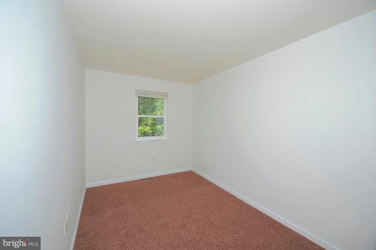 8228 Monaegan Court Severn, MD 21144 - Photo 8 of 9 a view of a small space with window