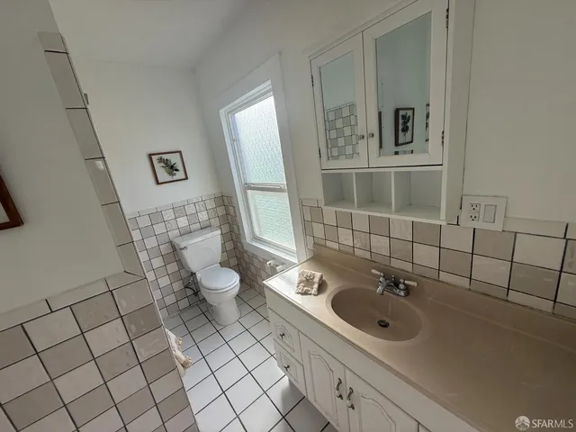 $899,000 | 8122 Geary Boulevard, San Francisco, CA 94121