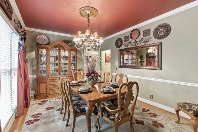a bathroom with a double vanity sink mirror and shower