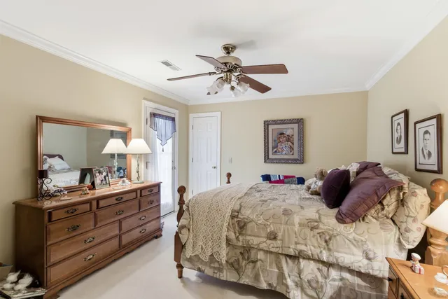 an aerial view of a house with a lake view