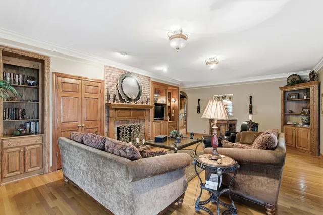 a kitchen with stainless steel appliances granite countertop a stove and a refrigerator