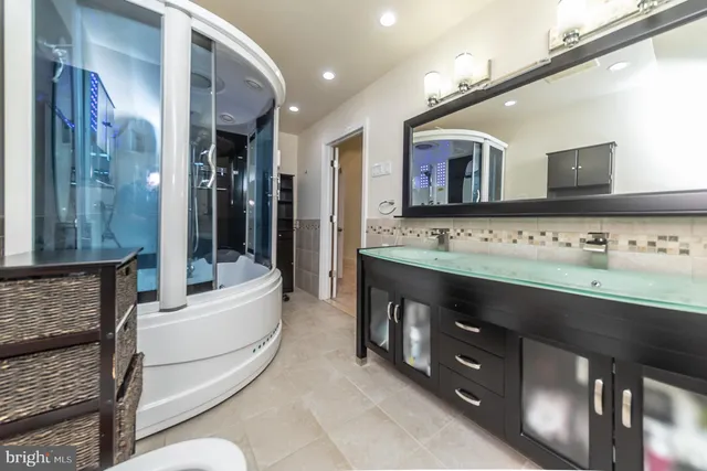 a view of an empty room with windows