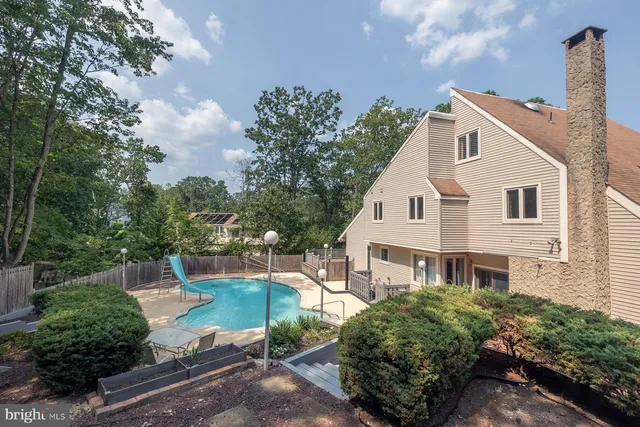 a balcony with view of outdoor space