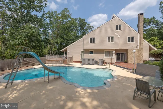 a view of a house with a park
