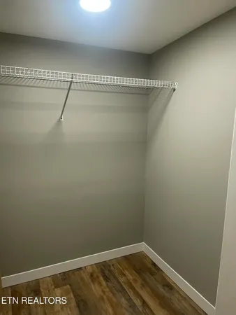 a view of a room with racks on the wall
