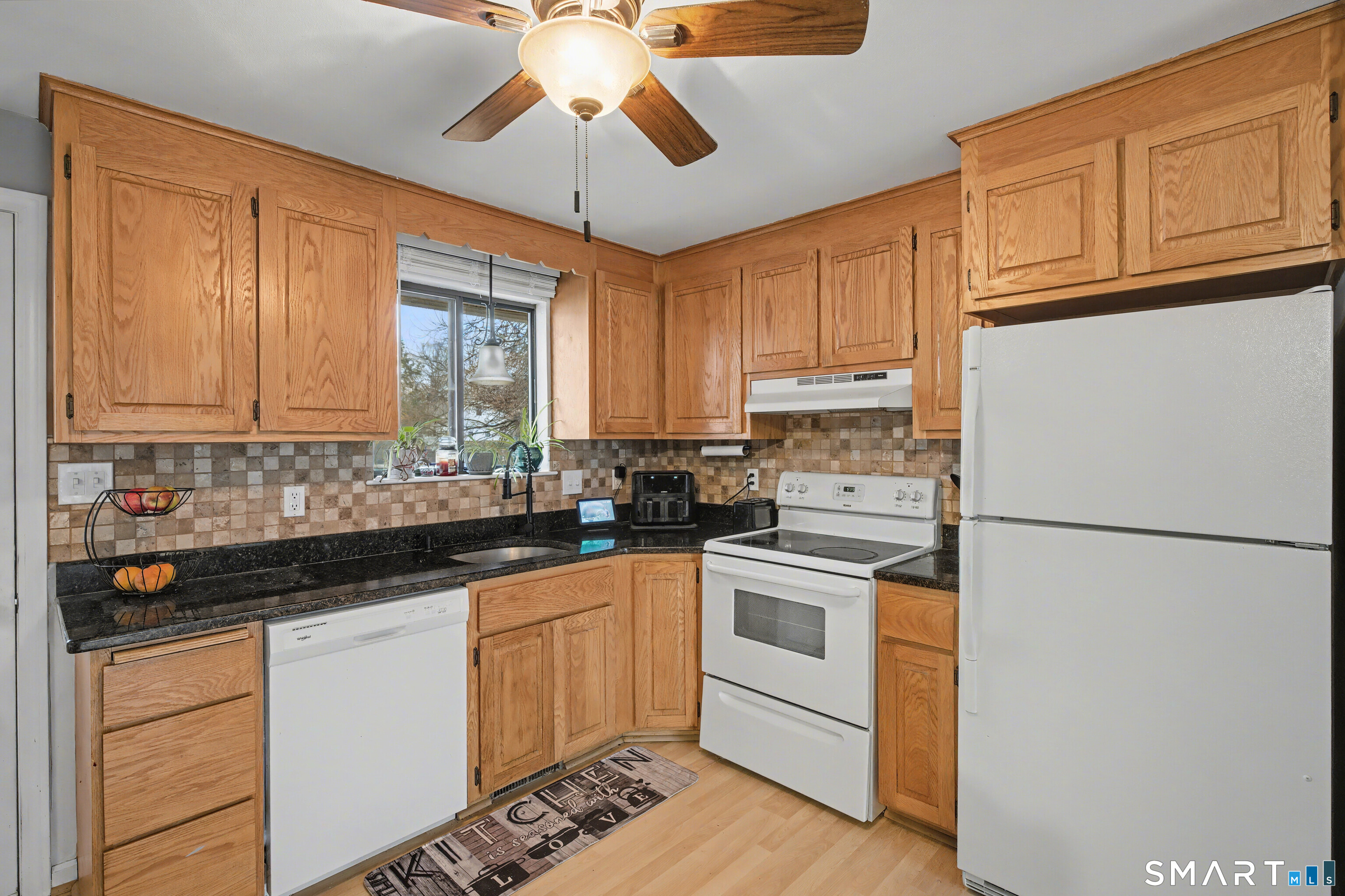 120 West Main Street, Unit 206 Meriden, CT 06451 - Photo 11 of 37 a kitchen with a white cabinets and white appliances