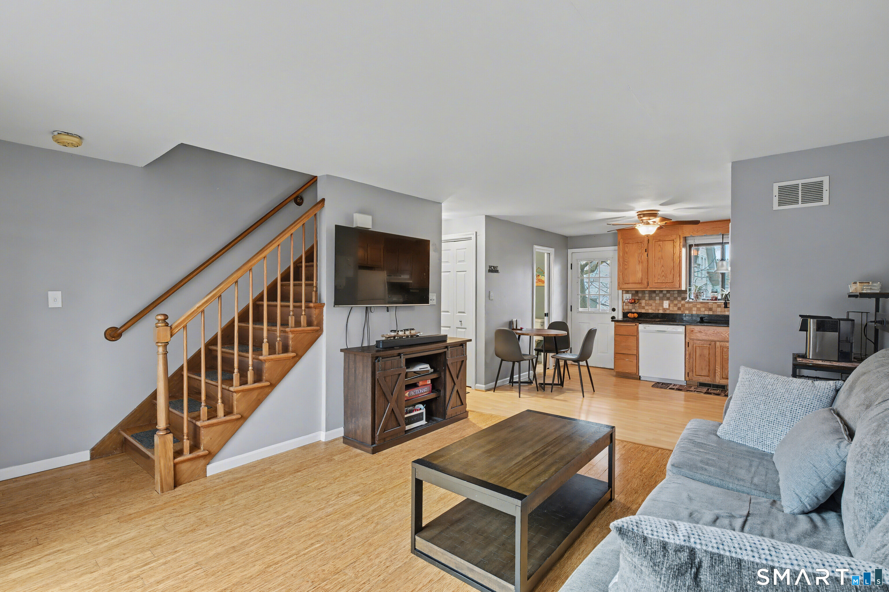 120 West Main Street, Unit 206 Meriden, CT 06451 - Photo 14 of 37 a living room with furniture and a flat screen tv
