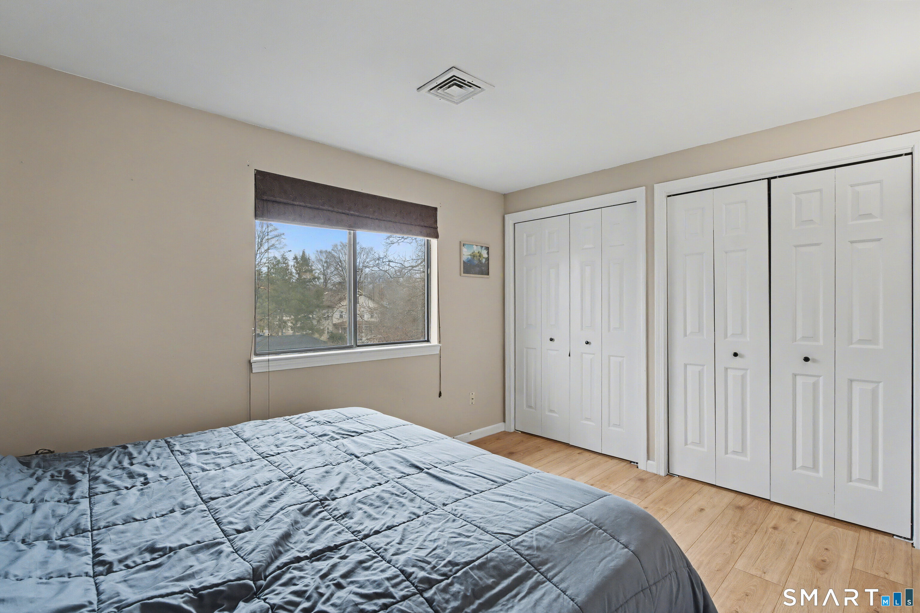 120 West Main Street, Unit 206 Meriden, CT 06451 - Photo 18 of 37 a bedroom with a bed and a window