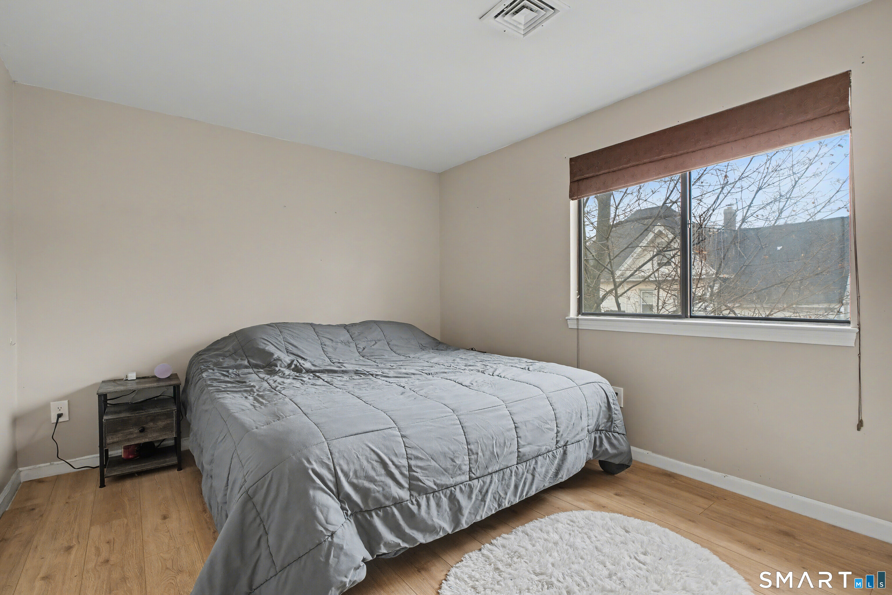 120 West Main Street, Unit 206 Meriden, CT 06451 - Photo 20 of 37 a bedroom with a bed and a window