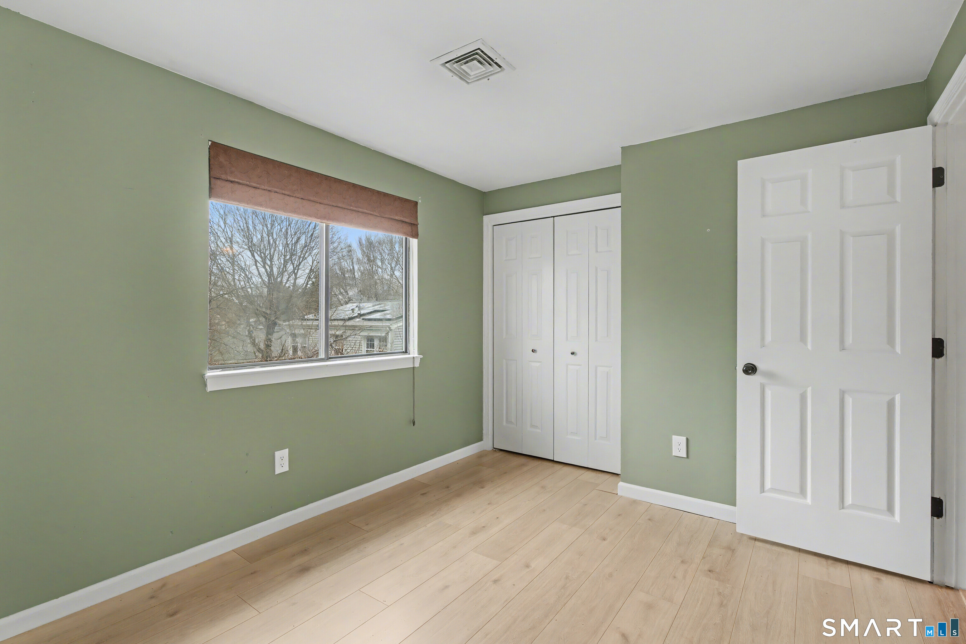 120 West Main Street, Unit 206 Meriden, CT 06451 - Photo 24 of 37 a view of an empty room with a window