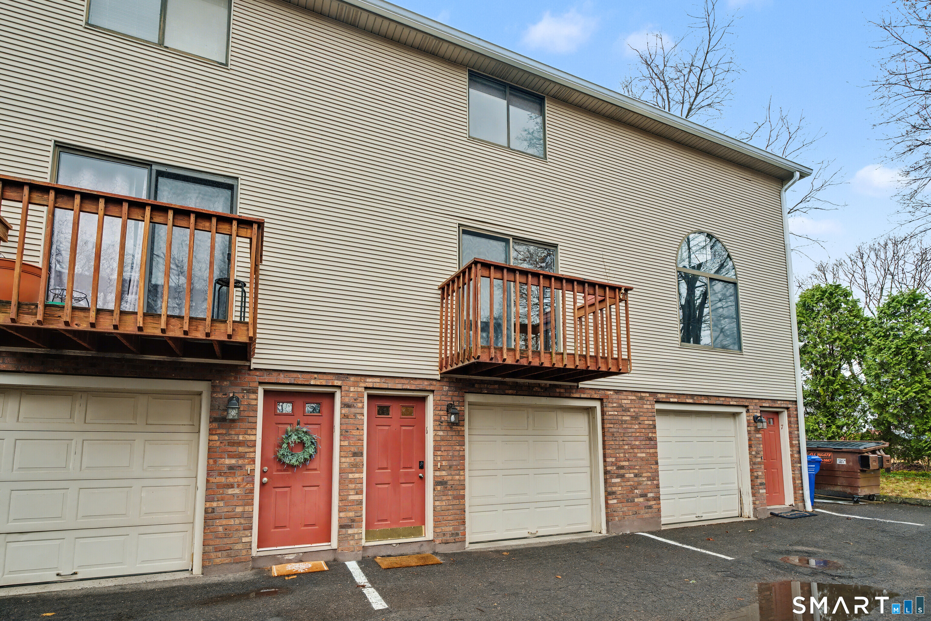 120 West Main Street, Unit 206 Meriden, CT 06451 - Photo 31 of 37 a view of a house with entryway and parking