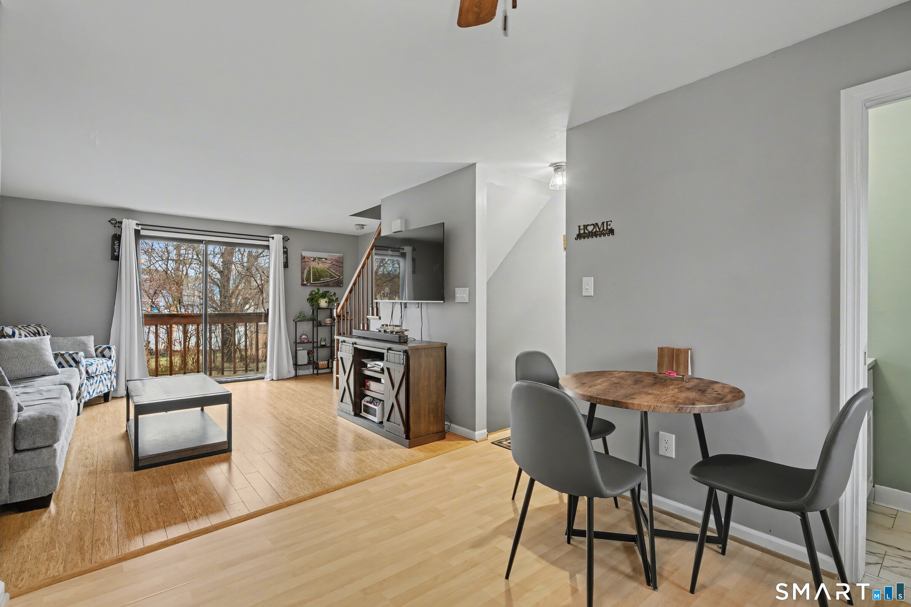 120 West Main Street, Unit 206 Meriden, CT 06451 - Photo 8 of 37 a dining room with furniture and large windows