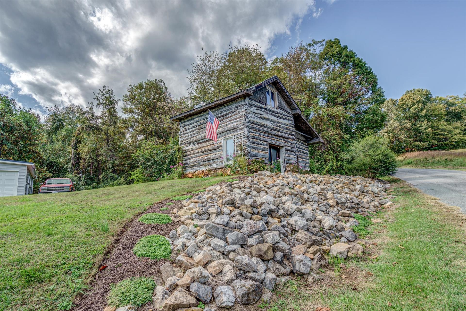 279 Morgans Fork Road, Unit 301 Penhook, VA 24137 - Photo 46 of 52 a view of a house with a yard