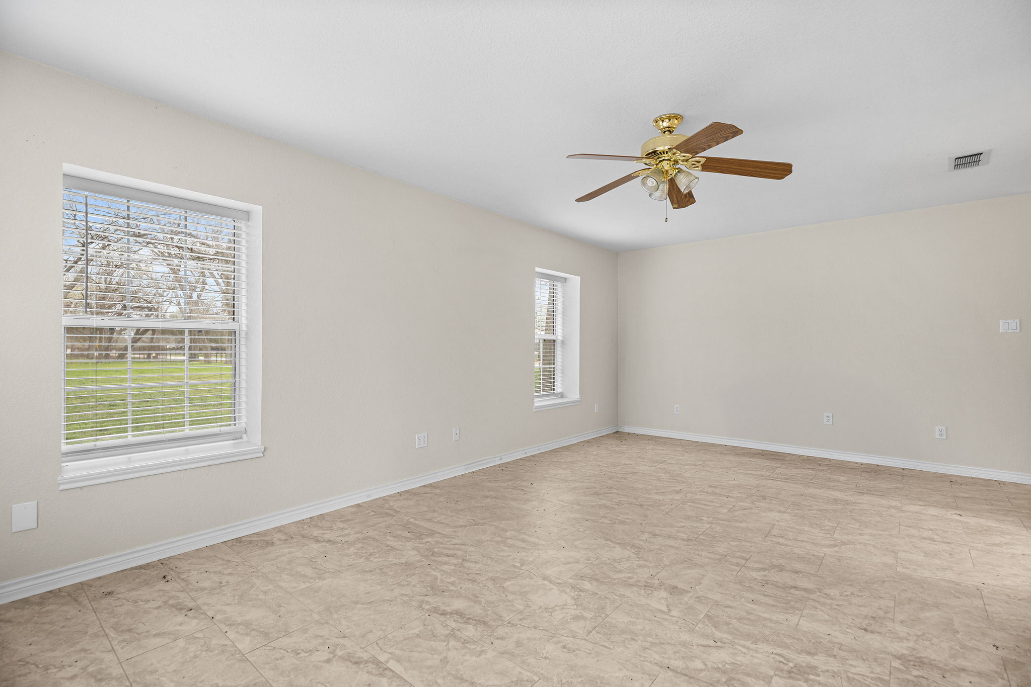 75 County Road 129 Taylor, TX 76574 - Photo 24 of 40 Empty room with ceiling fan and baseboards