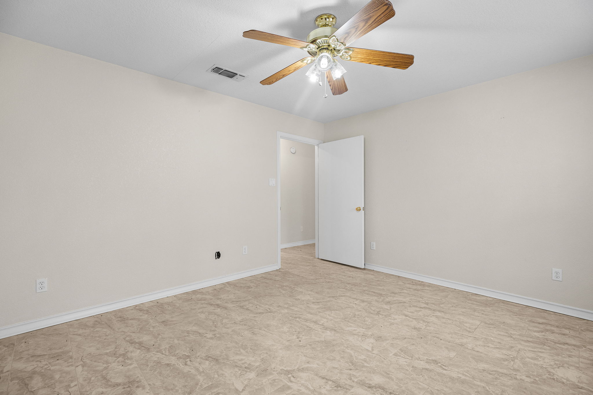 75 County Road 129 Taylor, TX 76574 - Photo 28 of 40 Empty room with baseboards and ceiling fan