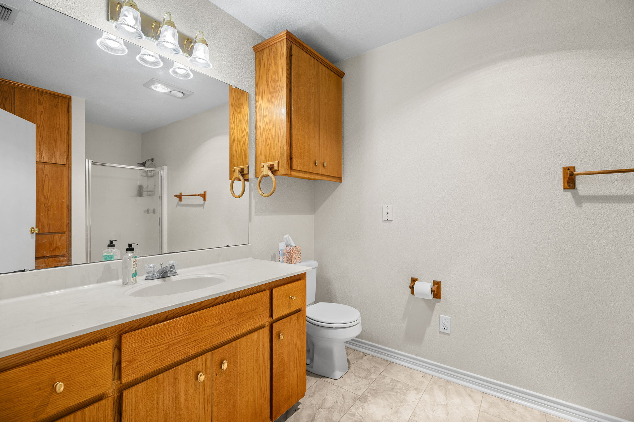75 County Road 129 Taylor, TX 76574 - Photo 29 of 40 Bathroom featuring a shower stall and vanity