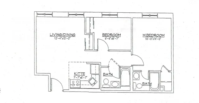 a bathroom with a sink mirror vanity and toilet