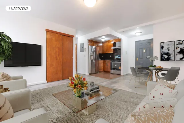 a view of a dining room with furniture and window