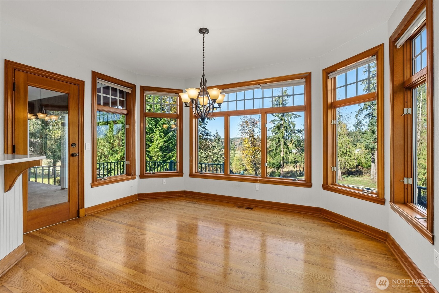 153 A Walhaupt Road Onalaska, WA 98570 - Photo 13 of 38 a view of an empty room with glass door and balcony