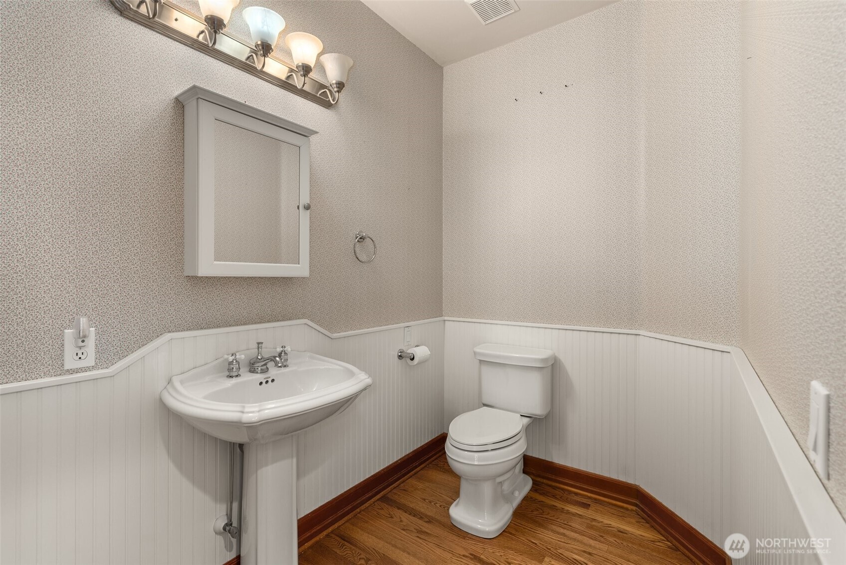 153 A Walhaupt Road Onalaska, WA 98570 - Photo 15 of 38 a bathroom with a sink toilet and a mirror