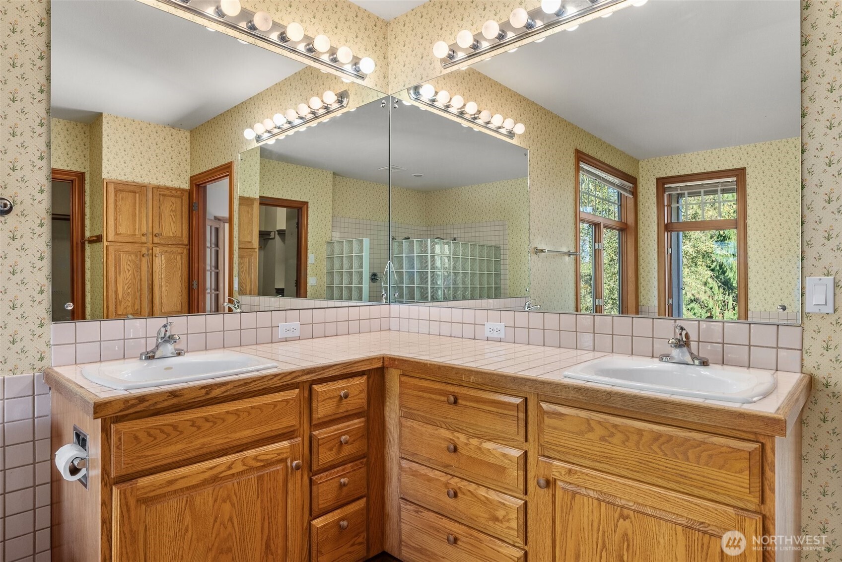 153 A Walhaupt Road Onalaska, WA 98570 - Photo 18 of 38 a bathroom with a sink double vanity and a shower