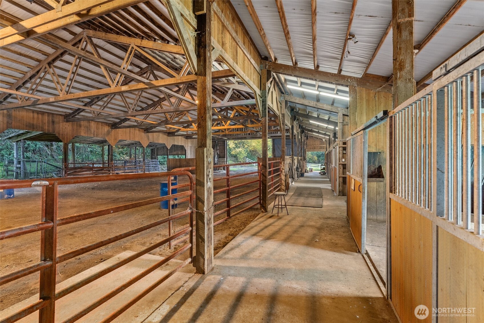 153 A Walhaupt Road Onalaska, WA 98570 - Photo 33 of 38 a view of an empty room with wooden floor