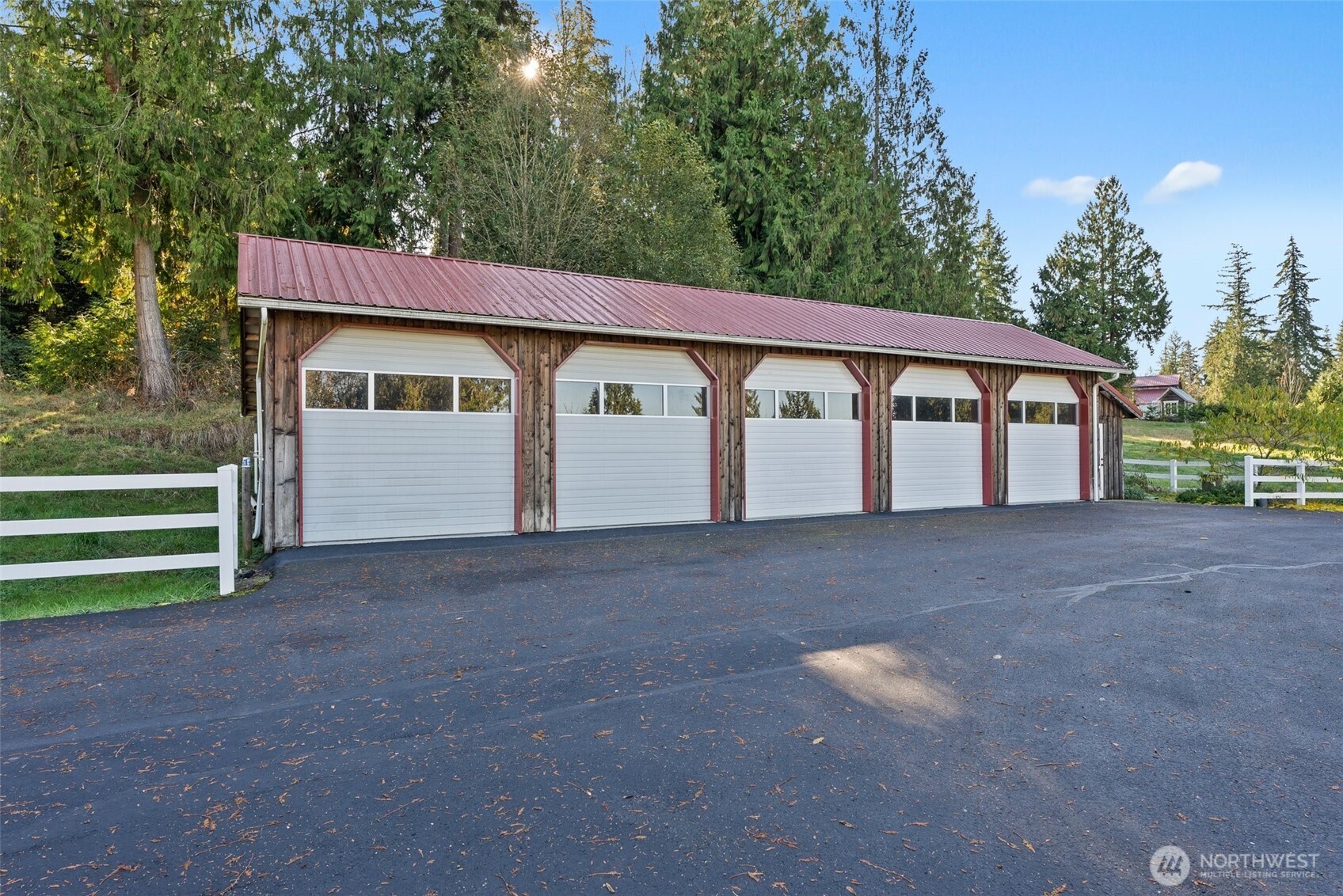 153 A Walhaupt Road Onalaska, WA 98570 - Photo 37 of 38 a view of a house with a yard and garage