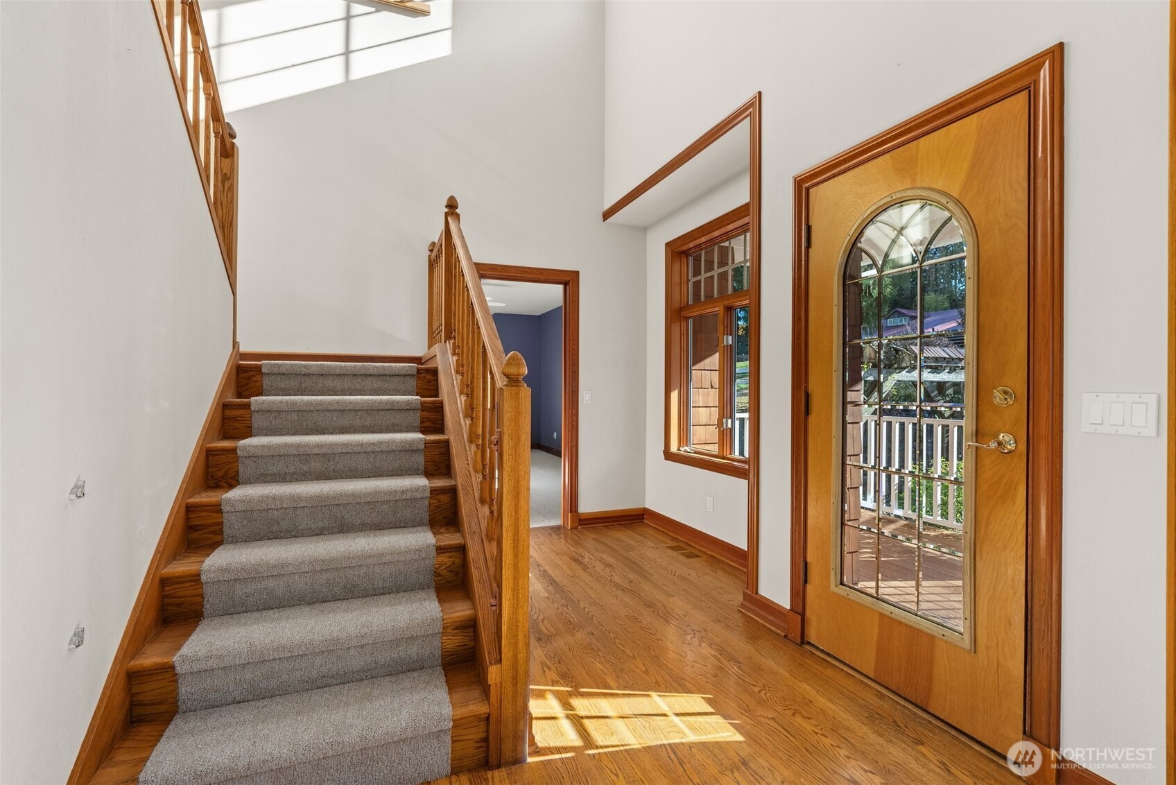 153 A Walhaupt Road Onalaska, WA 98570 - Photo 5 of 38 a view of an entryway with wooden floor and windows