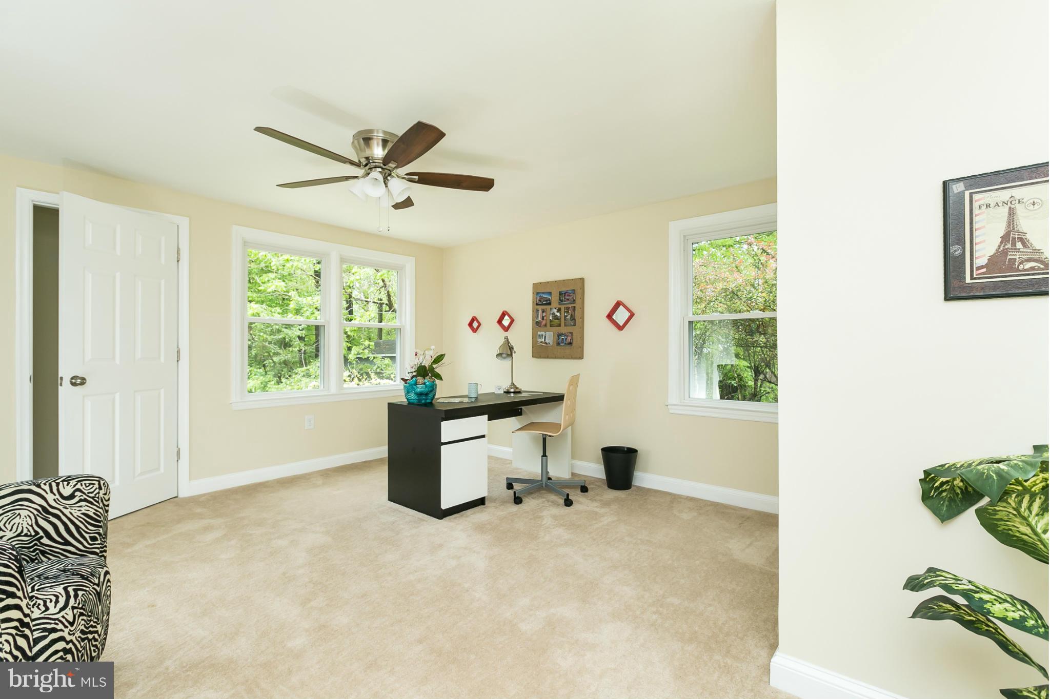 4122 Essex Road Baltimore, MD 21207 - Photo 19 of 30 a very nice looking room with a window