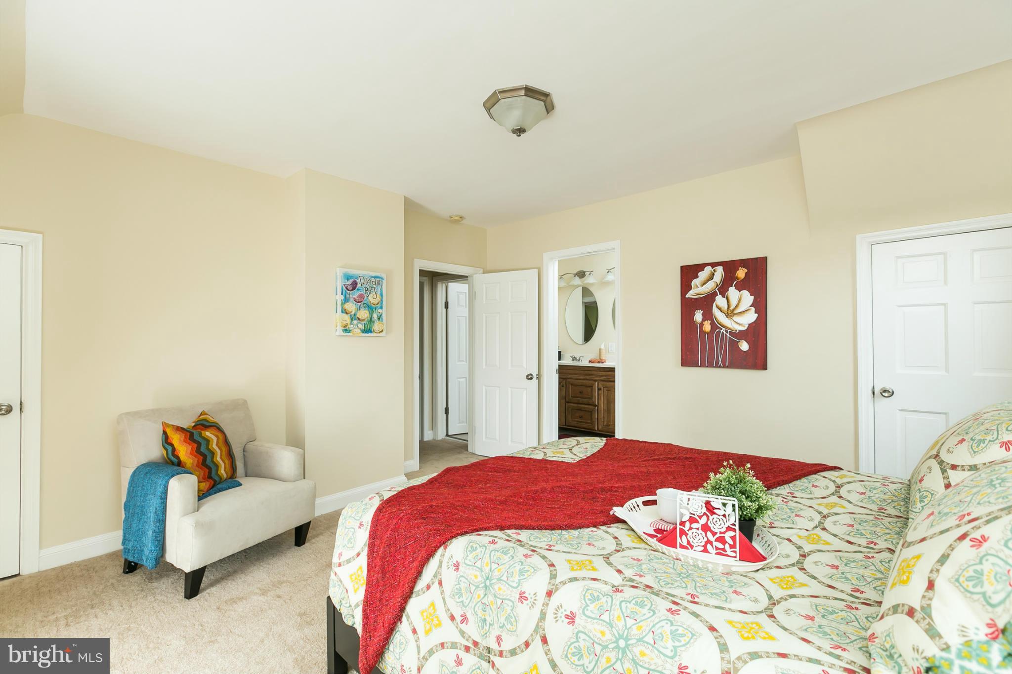 4122 Essex Road Baltimore, MD 21207 - Photo 3 of 30 a bedroom with a bed and a couch