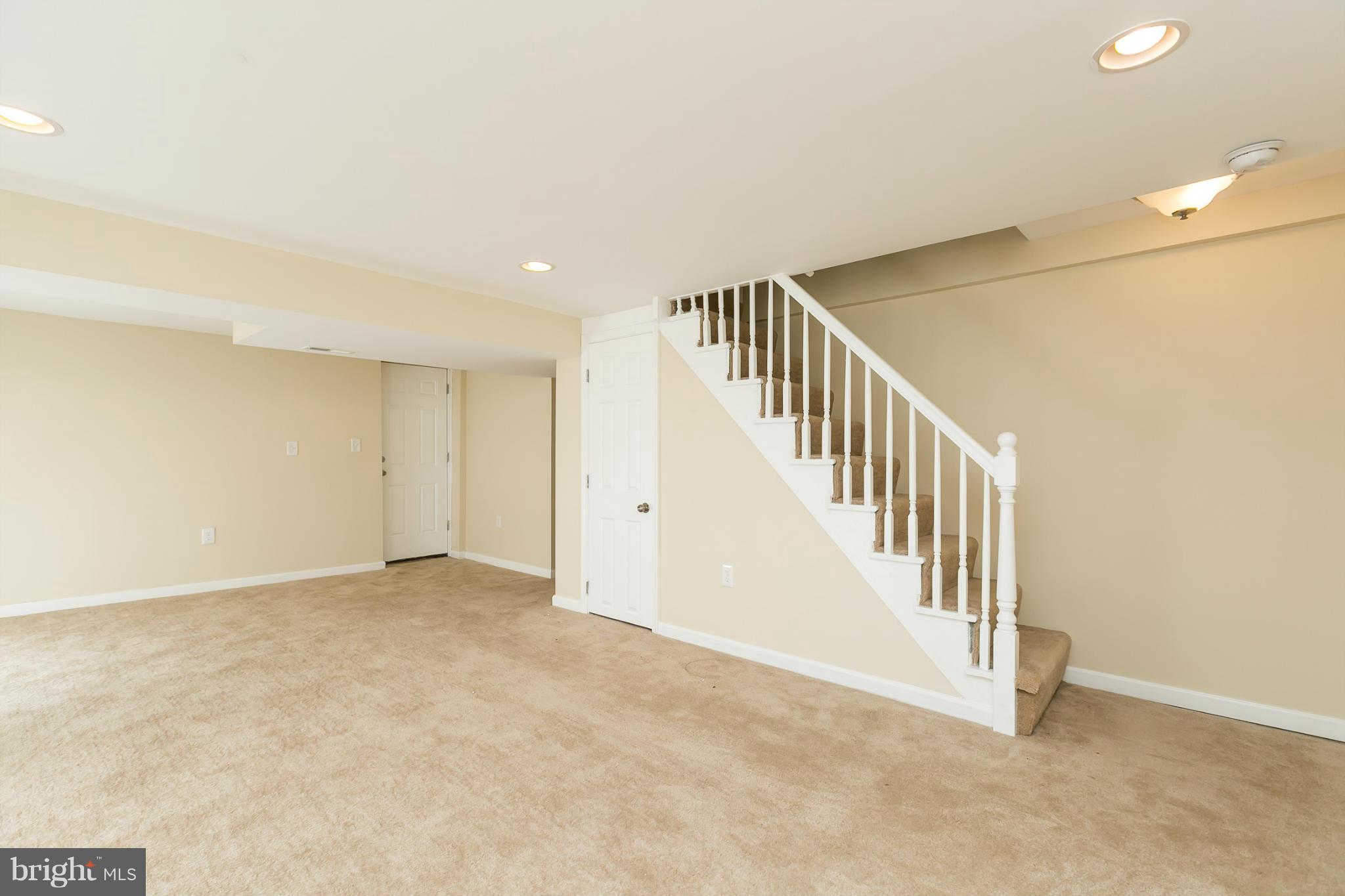 4122 Essex Road Baltimore, MD 21207 - Photo 21 of 30 a view of an entryway with stairs