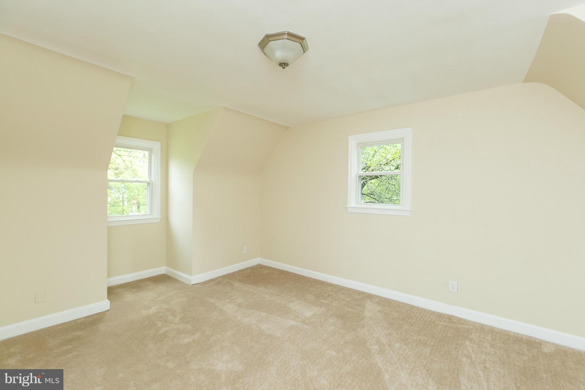 4122 Essex Road Baltimore, MD 21207 - Photo 7 of 30 a view of a small space with a window