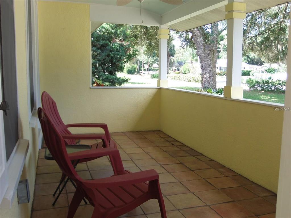 320 North Rhodes Street Mount Dora, FL 32757 - Photo 13 of 33 a view of a room that has a window and furniture