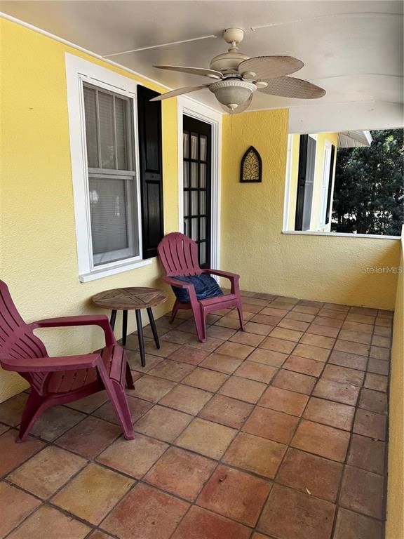 320 North Rhodes Street Mount Dora, FL 32757 - Photo 22 of 33 a outdoor space with lots of furniture and chandelier