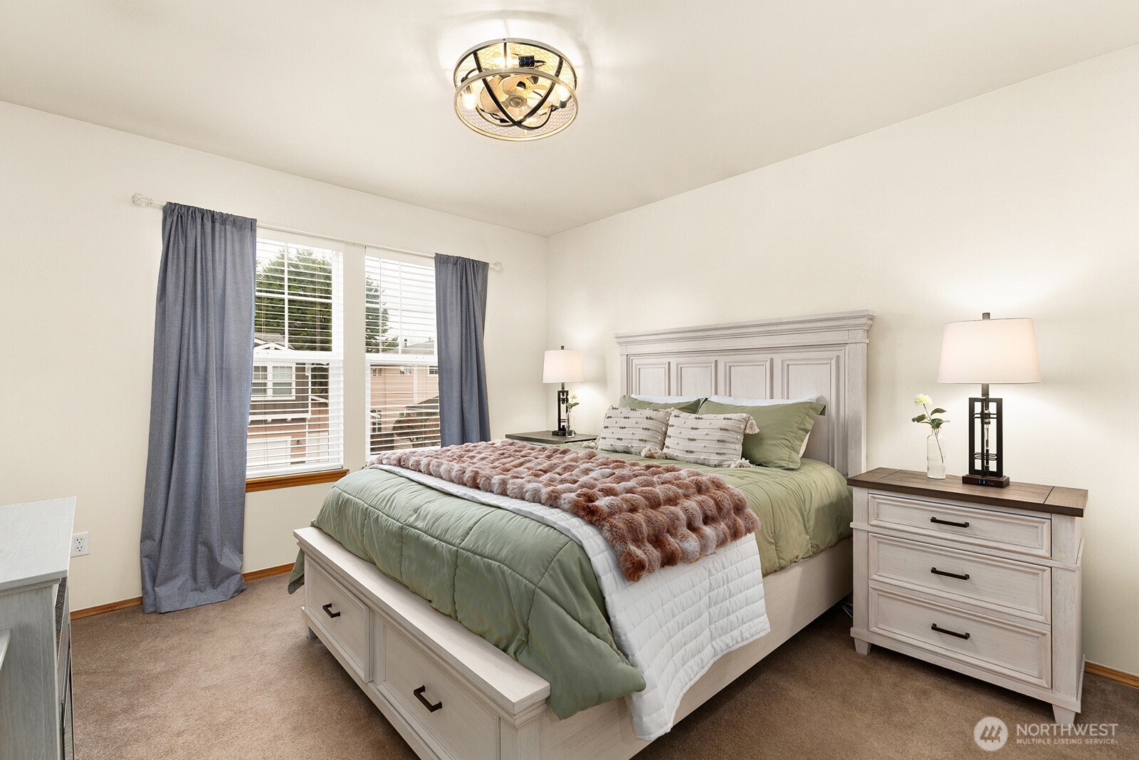 550 Pasco Place Northeast Renton, WA 98059 - Photo 23 of 32 a bedroom with a bed and a window