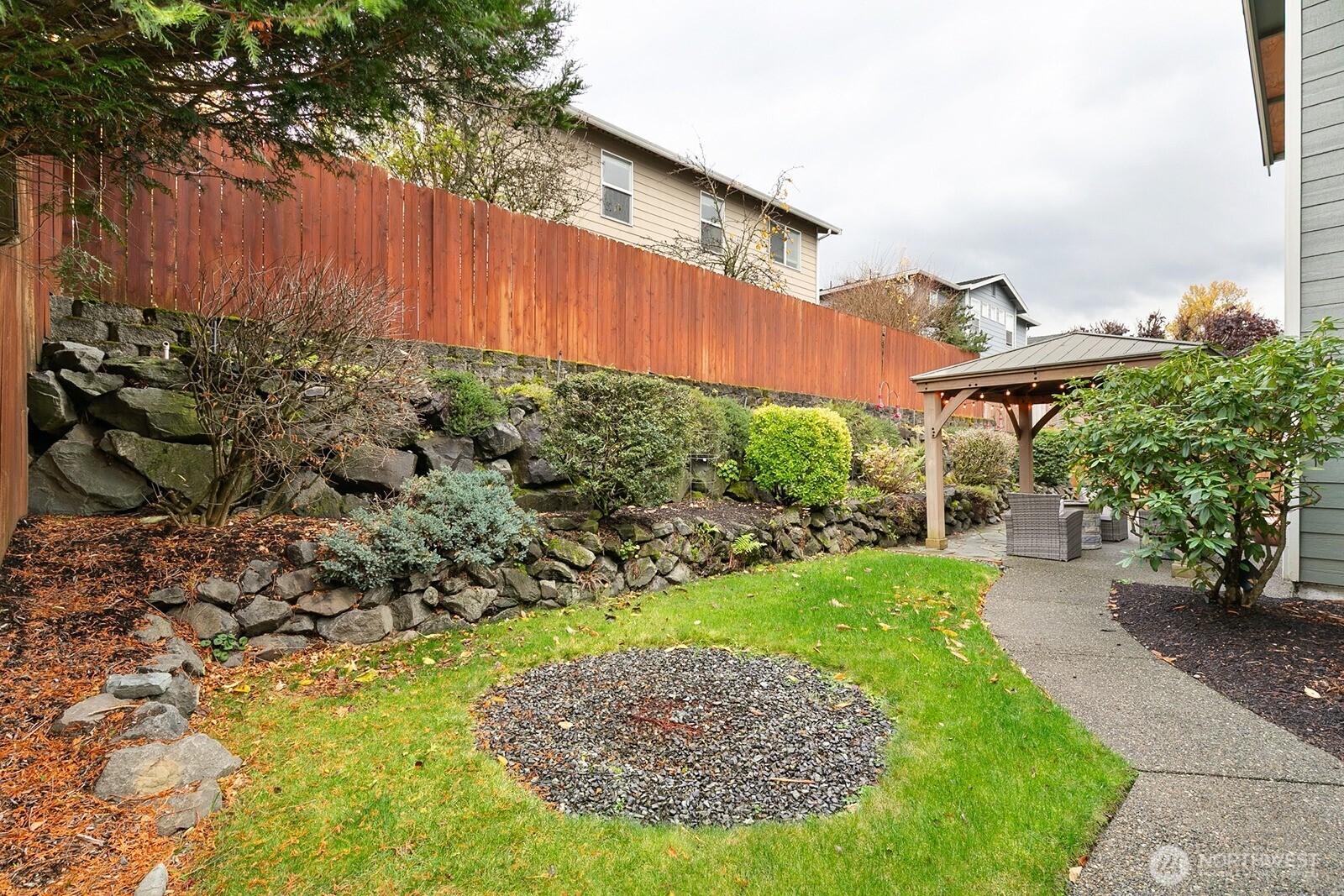 550 Pasco Place Northeast Renton, WA 98059 - Photo 30 of 32 a view of a back yard of the house
