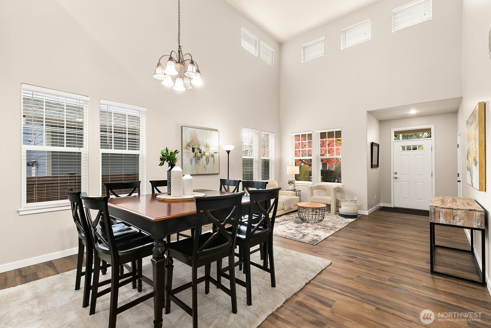 550 Pasco Place Northeast Renton, WA 98059 - Photo 7 of 32 a view of a dining room with furniture window and wooden floor