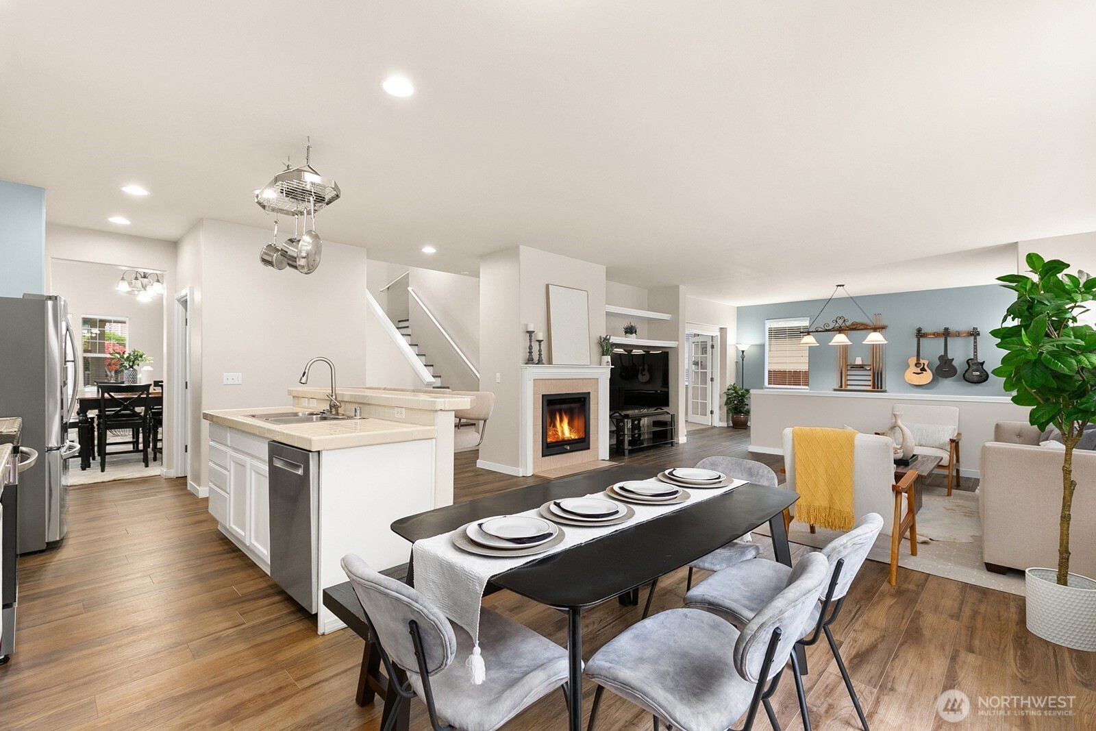 550 Pasco Place Northeast Renton, WA 98059 - Photo 10 of 32 a kitchen with a dining table chairs and view kitchen