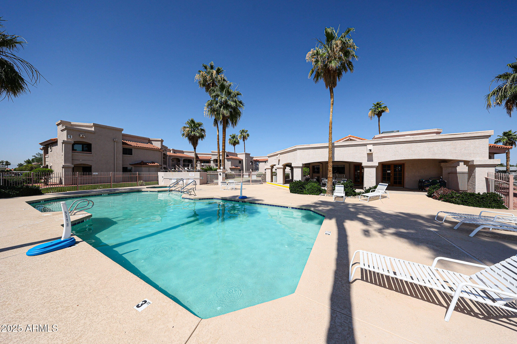 9151 West Greenway Road, Unit 162 Peoria, AZ 85381 - Photo 28 of 37 a front view of a house with garden