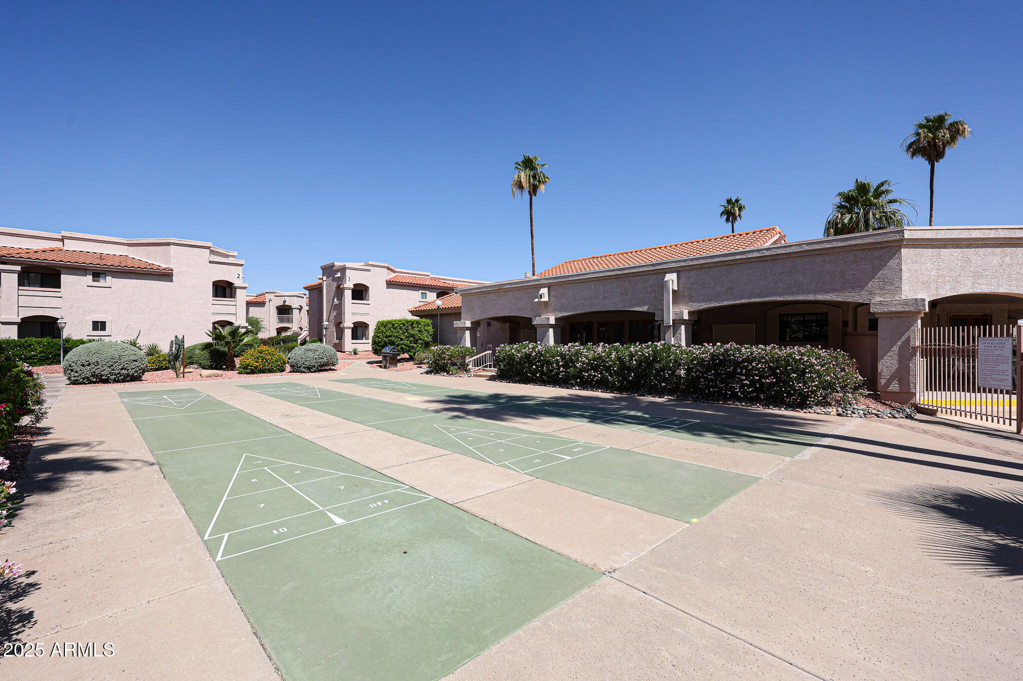9151 West Greenway Road, Unit 162 Peoria, AZ 85381 - Photo 29 of 37 a street view with a building in the background