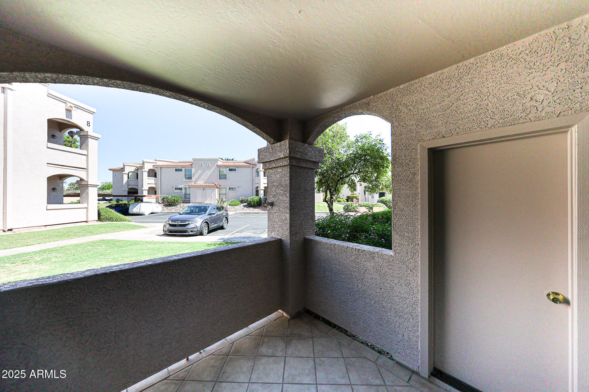 9151 West Greenway Road, Unit 162 Peoria, AZ 85381 - Photo 32 of 37 a room with window and view of living room