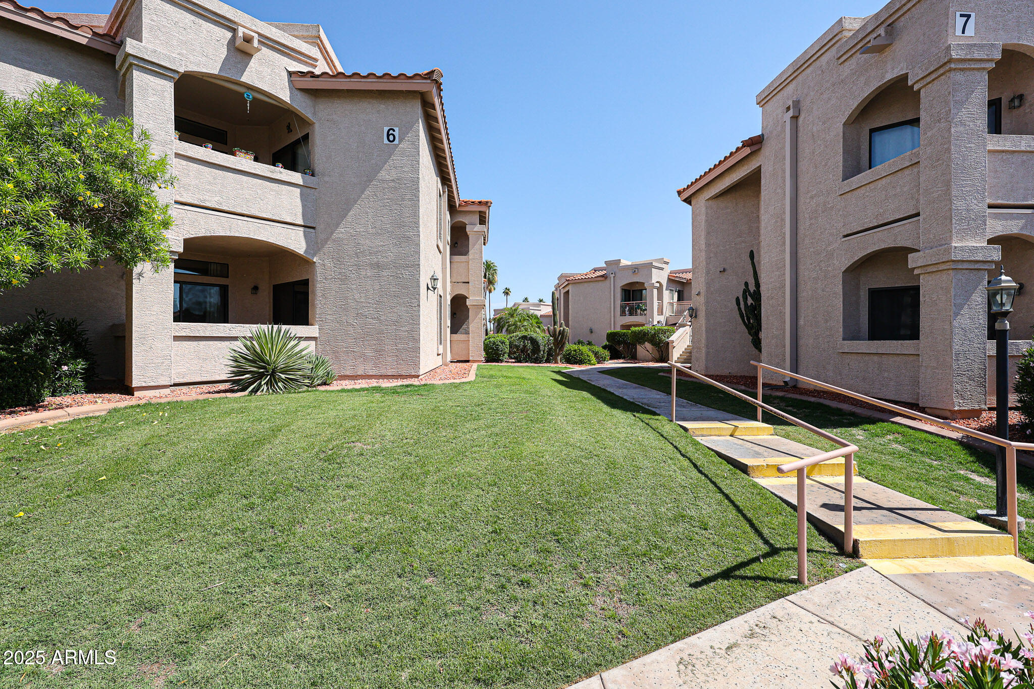 9151 West Greenway Road, Unit 162 Peoria, AZ 85381 - Photo 36 of 37 a view of a house with backyard